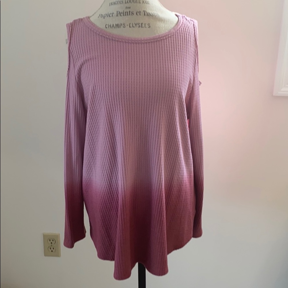 Long sleeve pink top. Exposed shoulders